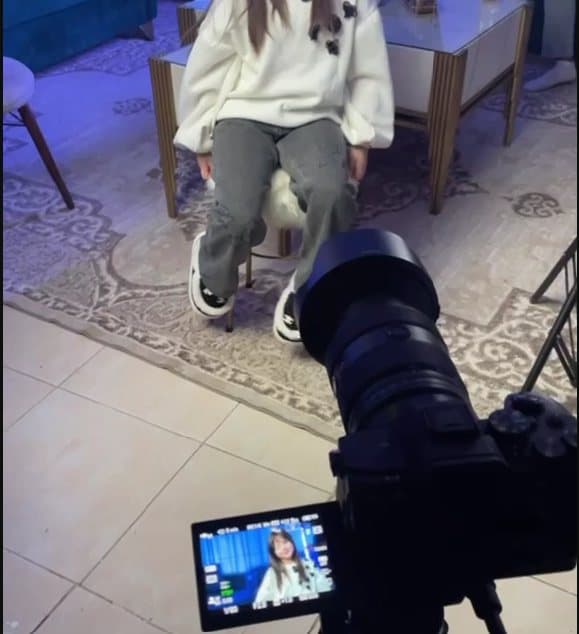 Behind the scenes filming an interview for the Digital Child Labor documentary